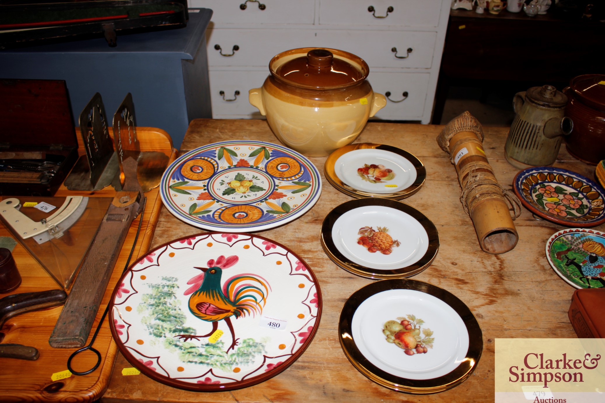 Two continental pottery platters, six fruit decora