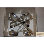 Various silver spoons; a pair of sugar nips etc.