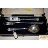 A cased three piece silver pickle set