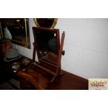 A 19th Century mahogany swing framed toilet mirror