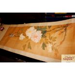 An Oriental scroll painting depicting birds on a b