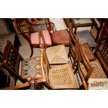 Four various cane and rush seated bedroom chairs;