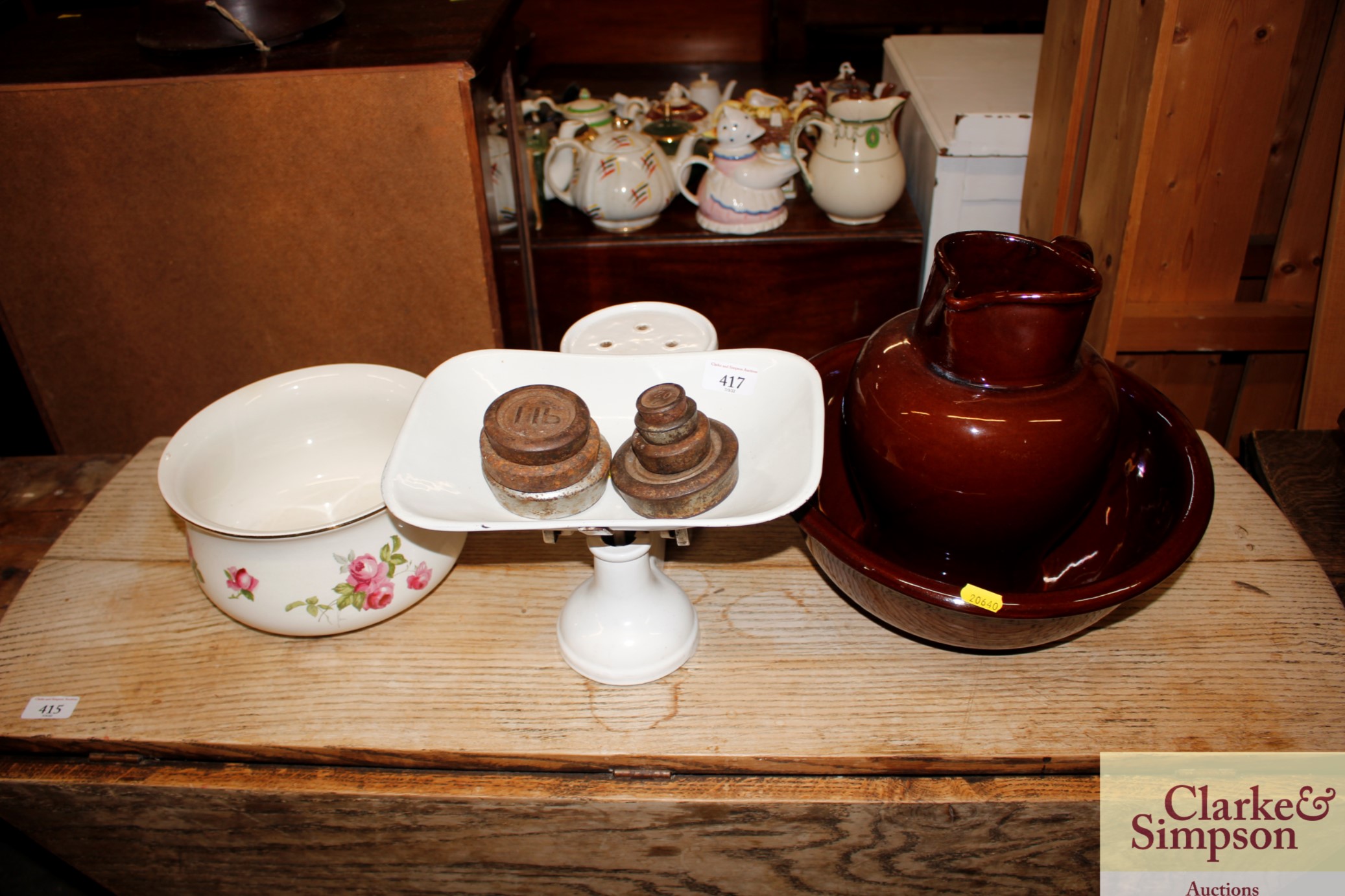 A brown glazed Bourne Denby toilet jug and bowl, a