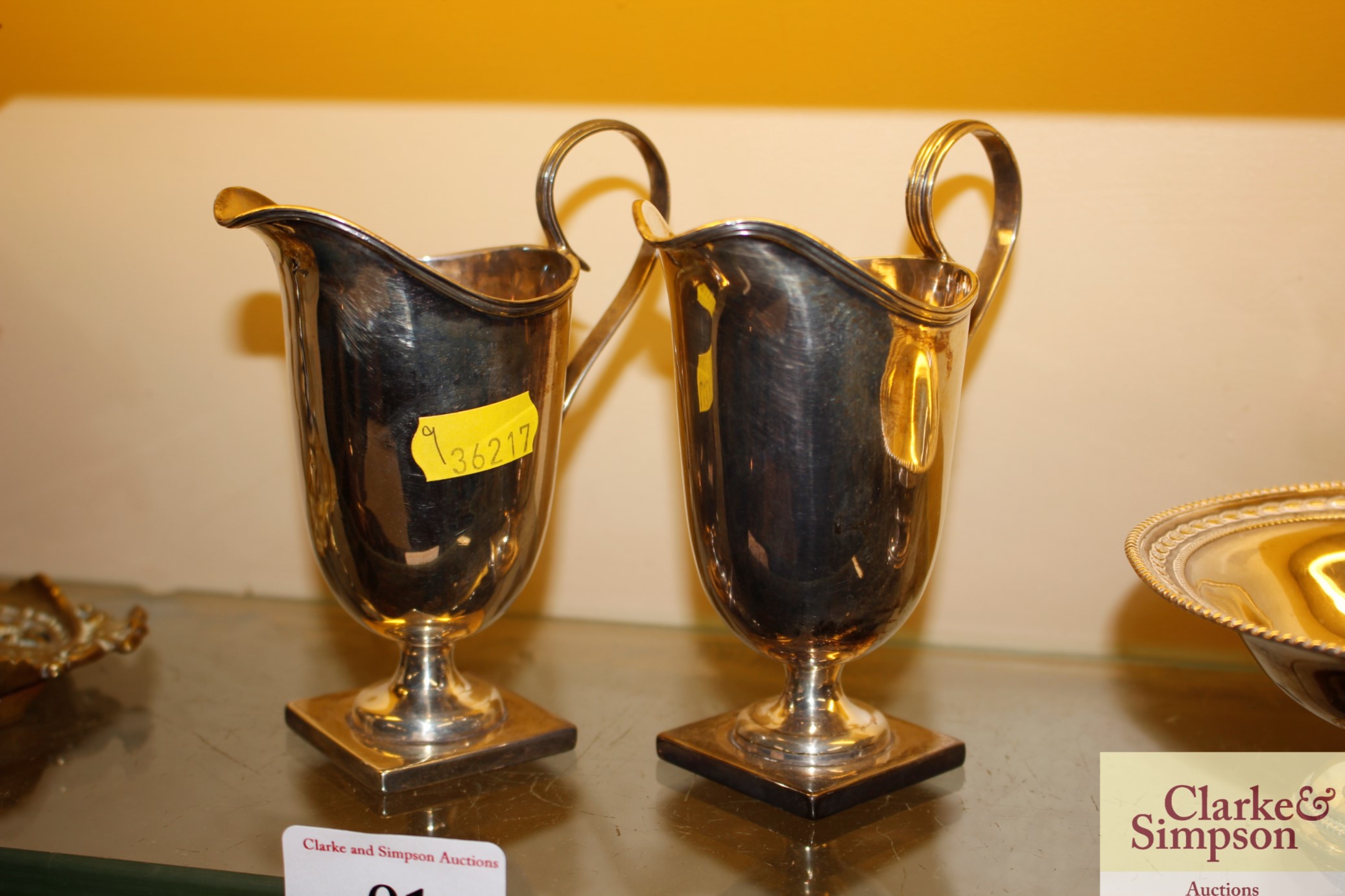 A pair of silver cream jugs, approx 7oz