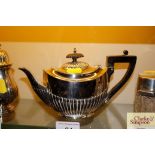 A silver bachelors teapot with half fluted body de