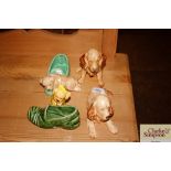 Four Sylvac dog ornaments