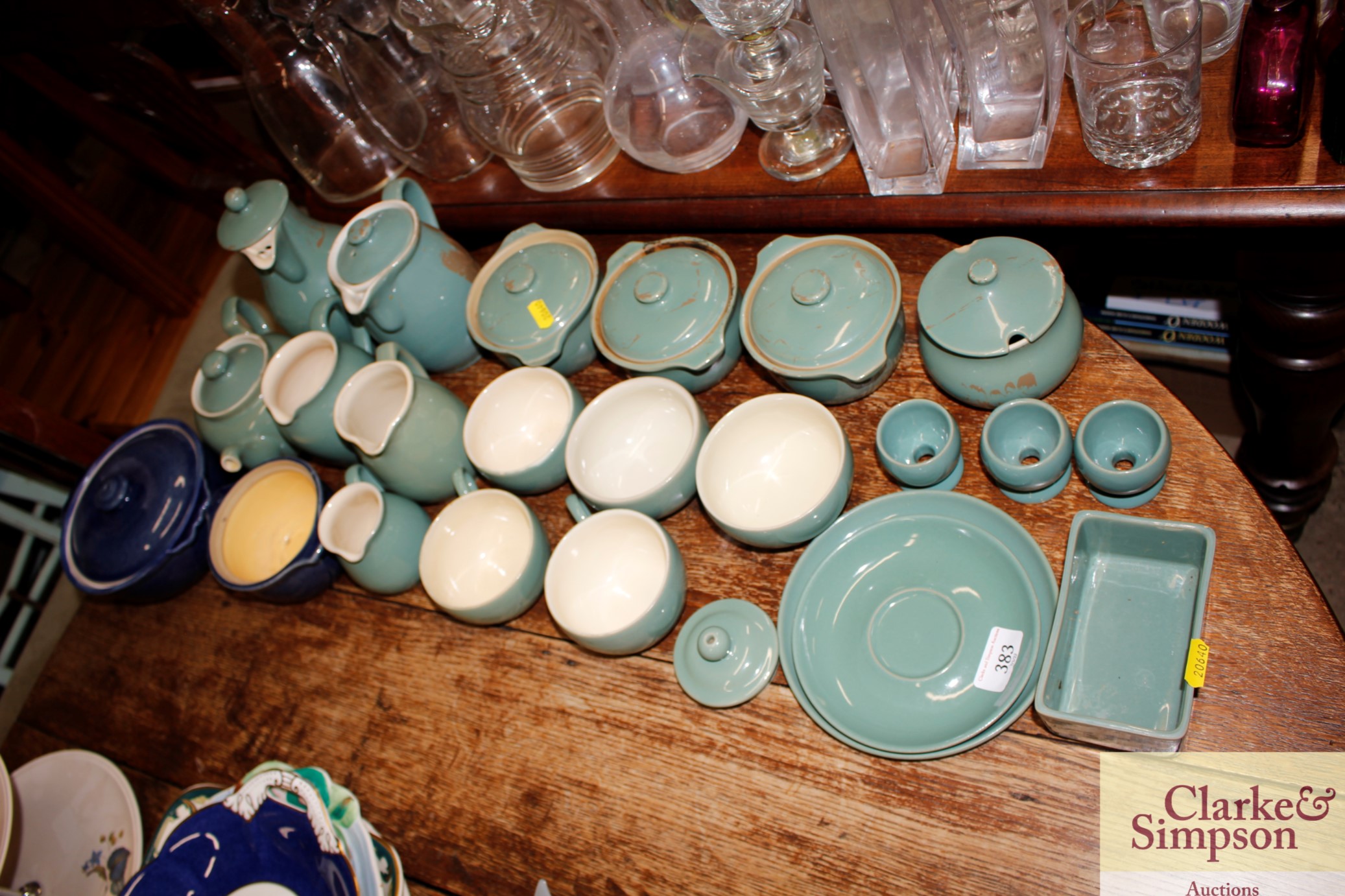 A quantity of green and blue Denby teaware