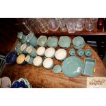 A quantity of green and blue Denby teaware