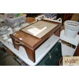 A bed table together with a needlework and brass f