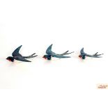 A set of three Beswick graduated flying swallows