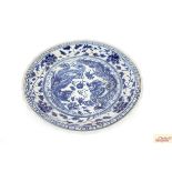 A large Oriental blue and white porcelain charger