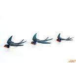 A set of three Beswick graduated swallows