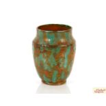 A Rye pottery vase with green and brown mottle gla