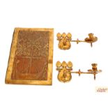 A pair of Art Nouveau brass folding candle sconces