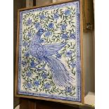 A large blue and white pottery tiled mural (possib