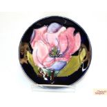 A Moorcroft "Hibiscus" decorated pin dish, impress