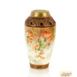 An Alexandra porcelain vase with all over floral d