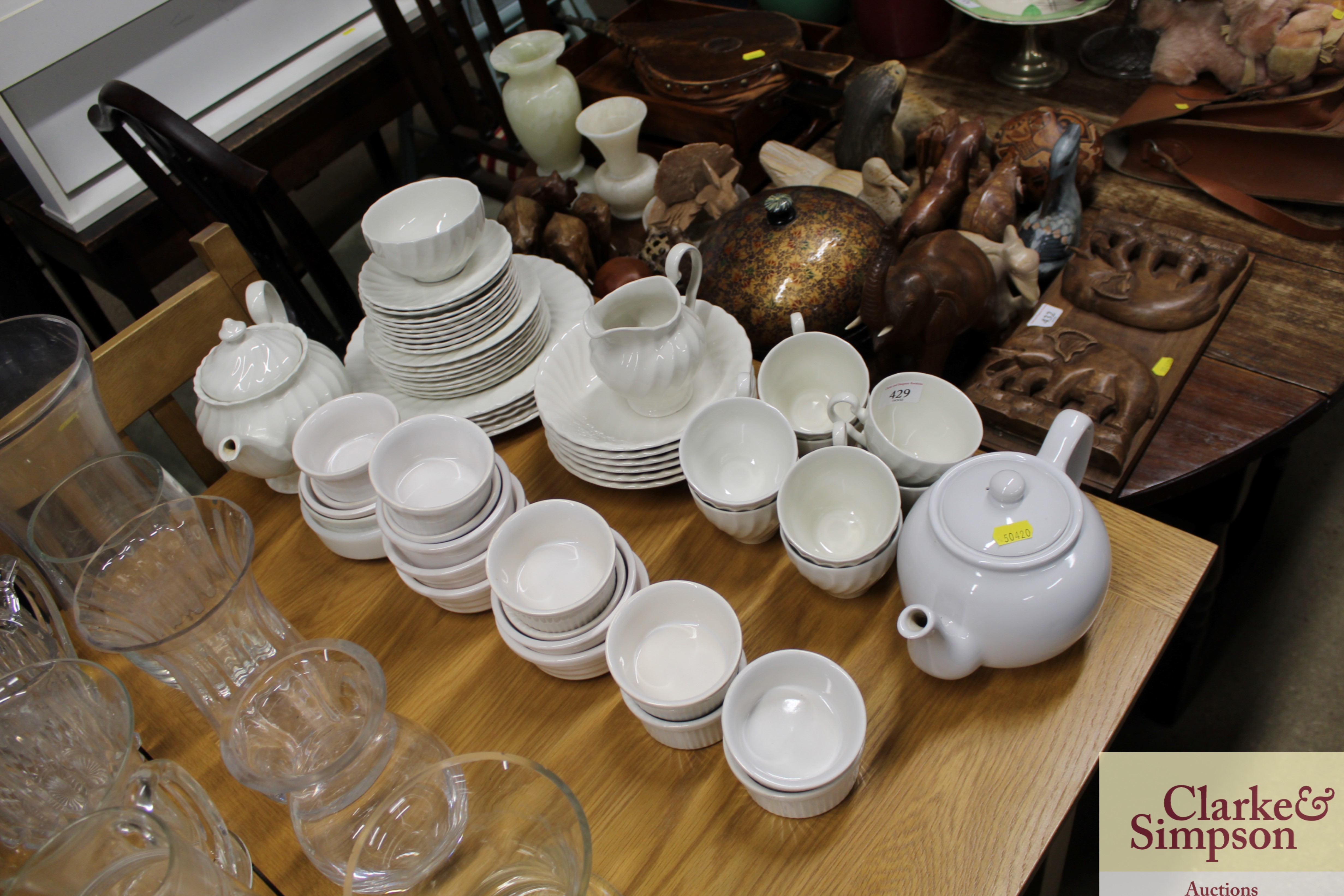 A quantity of white glazed tea and dinnerware