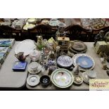 A novelty teapot; various decorative plates; crest