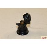 A Victorian bronze novelty thimble holder in the f