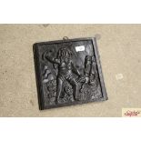 A antique naïve carved oak panel depicting Cain mu