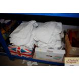 Two boxes of various bed linen