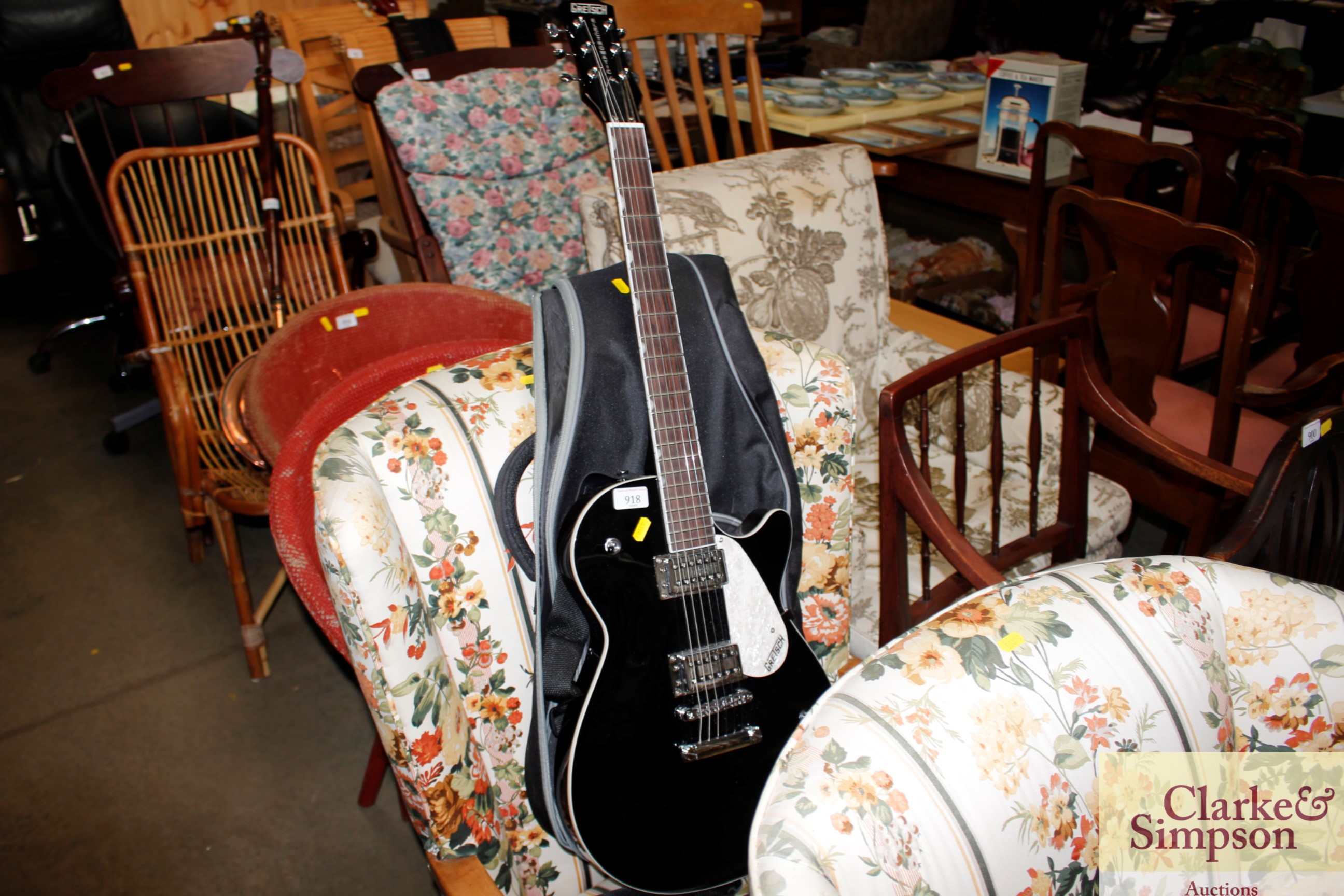 A Gretsch electric guitar and carry bag