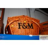 An F&M wicker picnic hamper