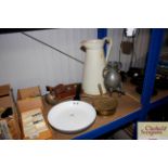A plastic jug; pewter vessel; frying pan etc.