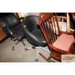 A leather upholstered swivel office chair