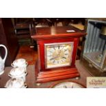 A Edwardian mahogany cased mantel clock with eight