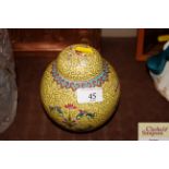 A Chinese enamel and yellow ginger jar and cover w