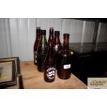 Six various vintage beer bottles