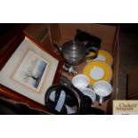 A box of miscellaneous tea ware; a pewter teapot;