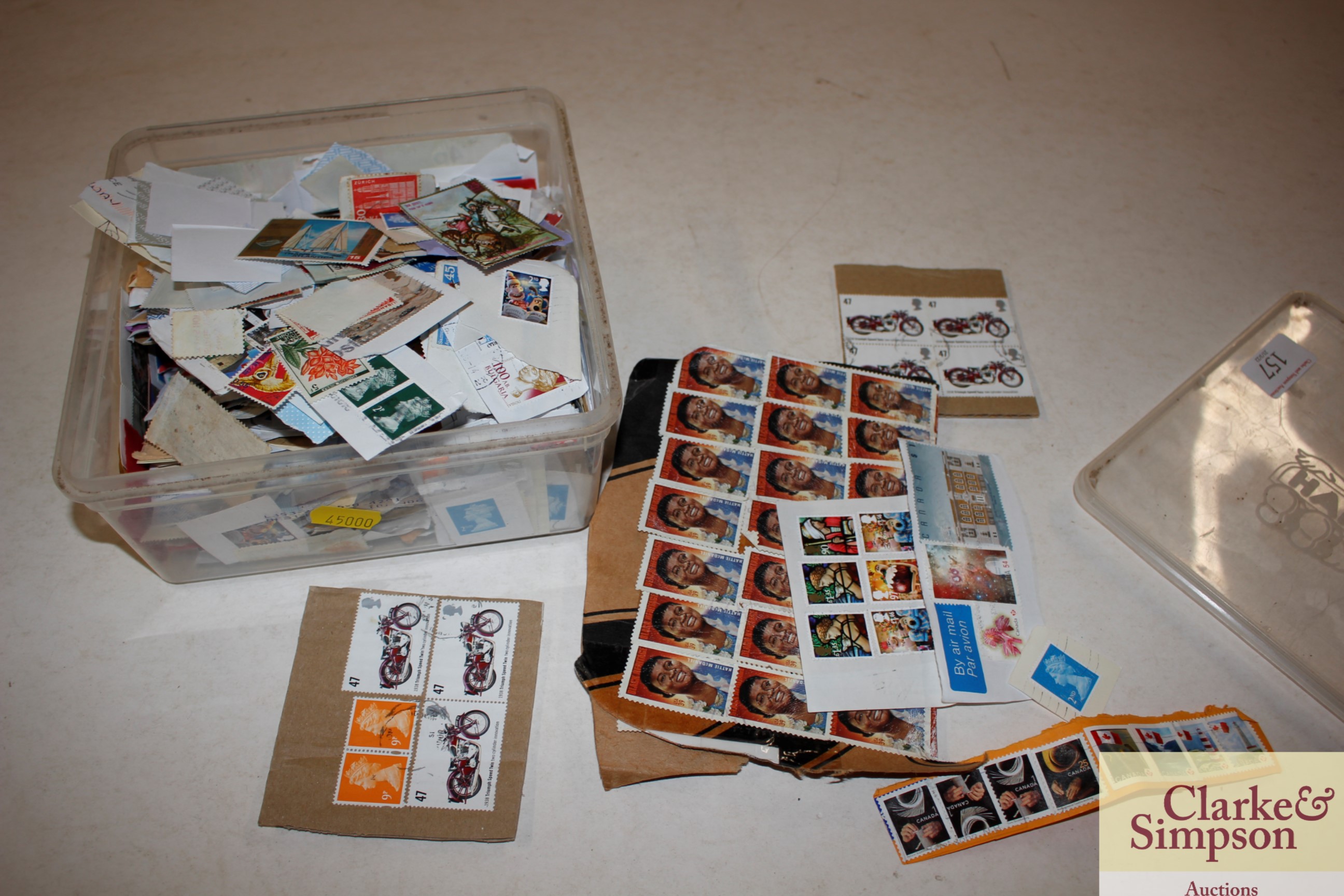 A box of miscellaneous loose stamps