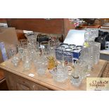A quantity of table glassware to include decanters
