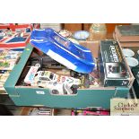 A box containing remote control car and various pa
