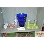 A dressing table set together with a blue glass va