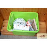 A box of various sundry items to include a wall cl