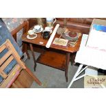 A mahogany two tier side table