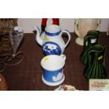 A 19th Century blue and white coffee pot decorated