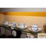 Four late 18th Century blue and white tea bowls an