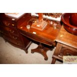 A Victorian rosewood work table fitted single draw