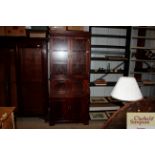 A modern mahogany bureau bookcase