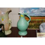 An Art Deco Chameleon ware green baluster jug wit