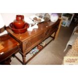 A Jacobean style oak dresser base