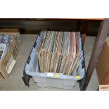 A box of various LPs