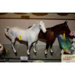 Two Beswick horses