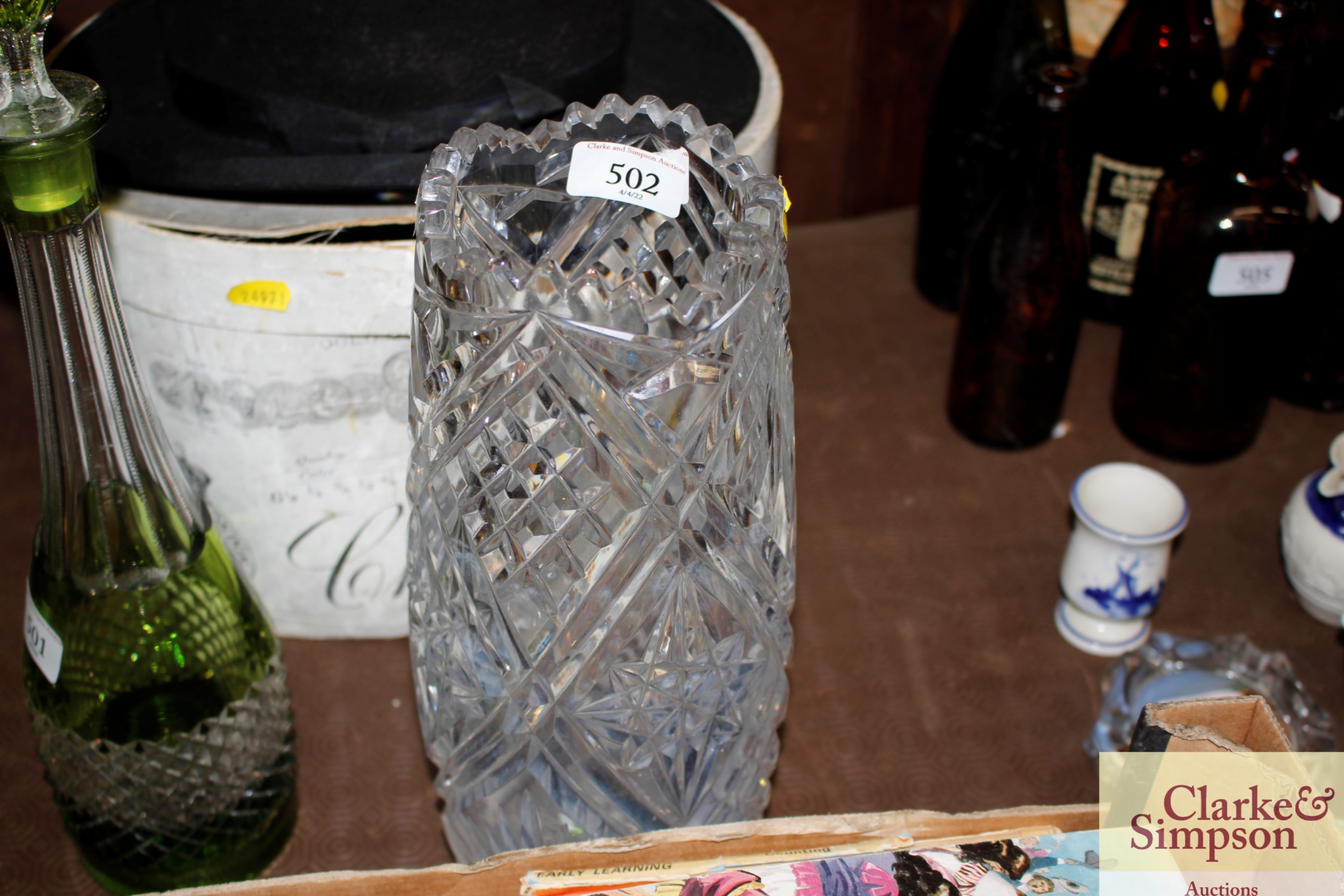 A heavy cut glass vase