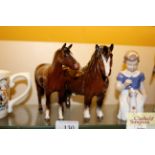 Two Beswick horses